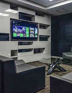 Game Room with Large Screen TV at 110 First Street Jersey City Apartments