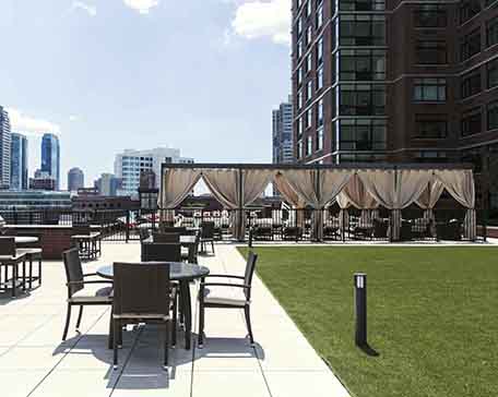Landscaped roof deck outside of the high rise apartments jersey city